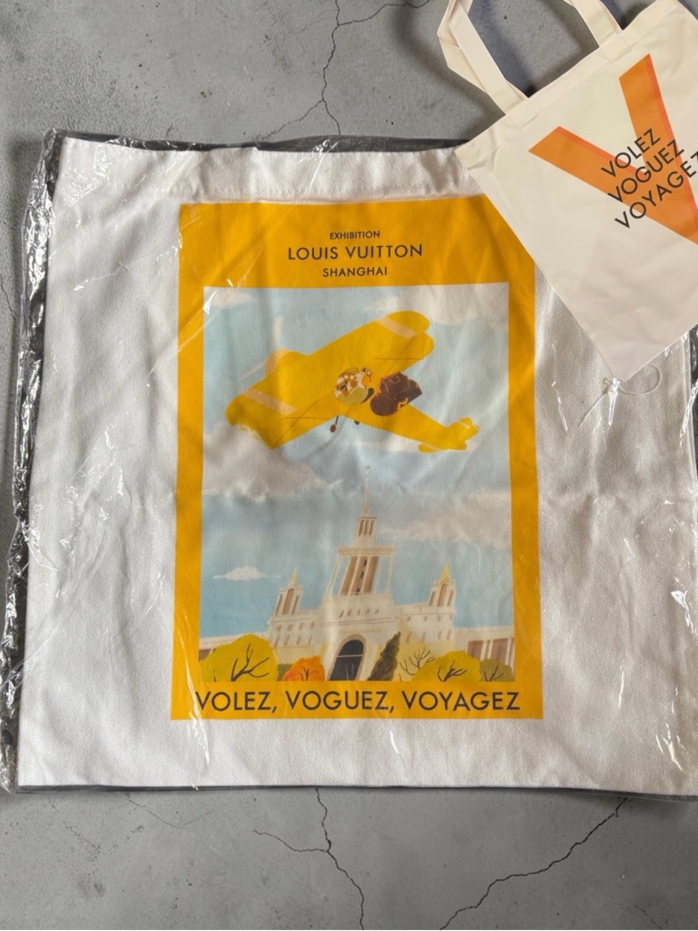 Louis Vuitton Shanghai special ed White Canvas Tote with Yellow Airplane Graphic